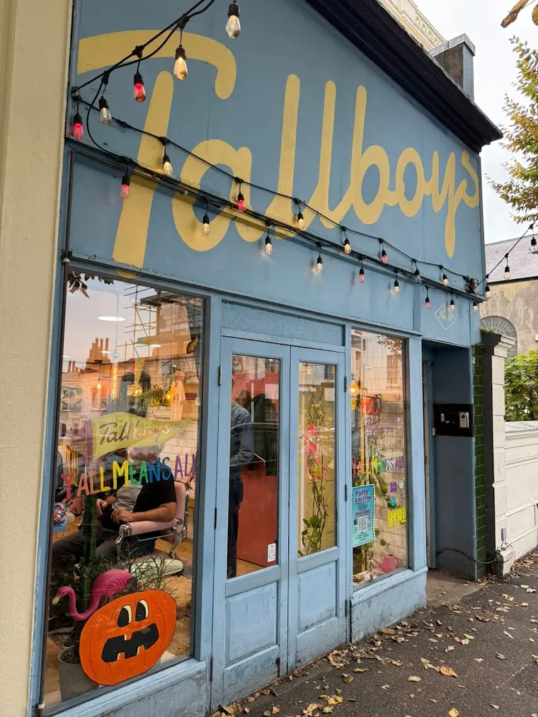 The blue-fronted Tallboys Barbershop on Montpelier Place, Brighton